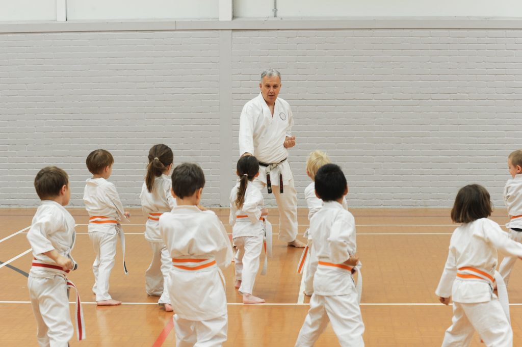 Four-year-olds developing balance and confidence during a Little Tigers karate class at Invicta Karate Academy in Sevenoaks.